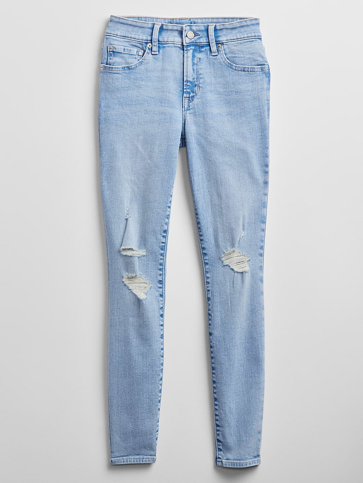 Image 1 of 4, Super-stretch denim that moves with you., Contoured waistband made to hug your curves all day long., Light indigo wash., Button closure, zip fly., Classic five-pocket styling., Distressed detailing at knee., Better denim. Better planet. This pair of denim is part of our water-saving Washwell™ program. Compared to conventional wash methods, Washwell™ has saved millions of liters of water since 2016., Product #676901