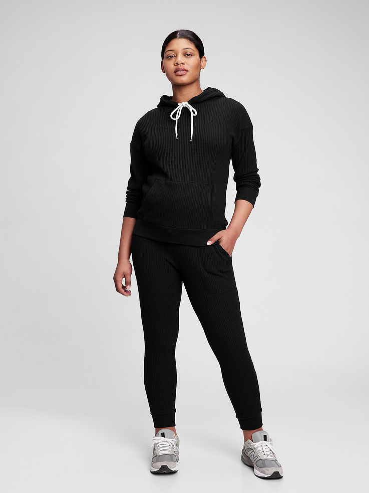 Image 1 of 1, Soft waffle-knit maternity hoodie., Long sleeves., Hooded neckline with drawcords., Front kanga pocket., Please note: Maternity styles cannot be returned in store. Please enjoy free returns by mail., Product #718640