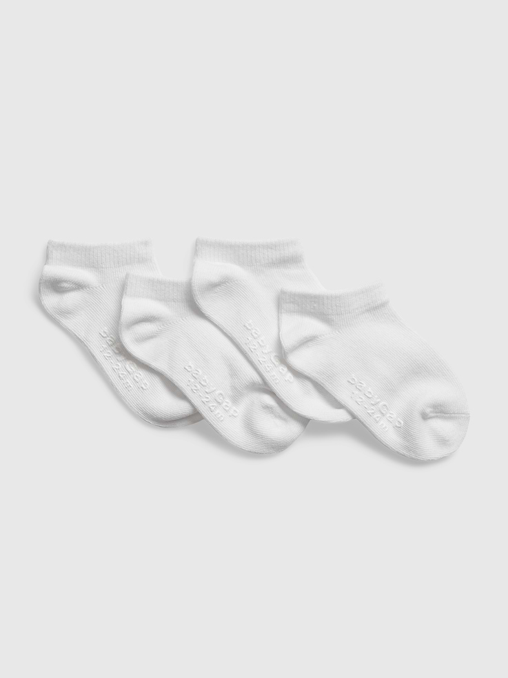 Image 1 of 1, Soft, stretch knit no-show socks., Ribbed top., Reinforced toe and heel., Assorted colors., This pair of socks is made with 10% recycled polyester. Compared to virgin materials, using recycled materials helps to reduce resource use and waste., This product was made in a factory that invests in gender equity and women’s empowerment through RISE. Learn more at gapinc.com/equity ., Product #846687