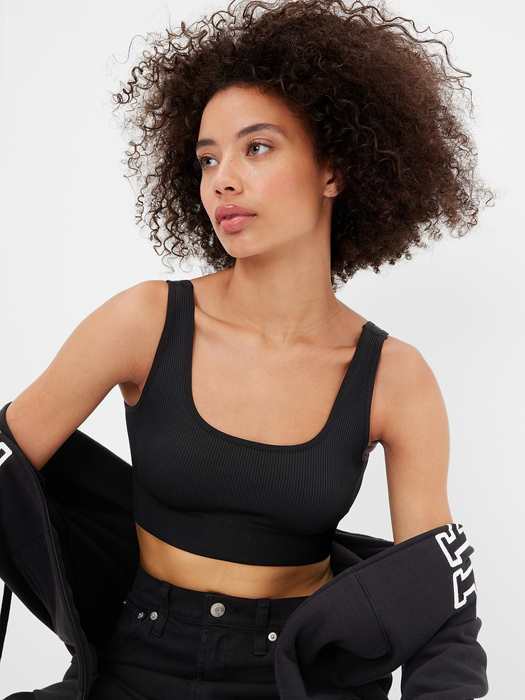 Image 1 of 1, Stretch ribbed knit., Tank straps., Scoopneck., Elasticized band at bottom., Note: The dye used in the crafting of this product is prone to crocking, or color transfer. Please avoid contact with light-colored fabric or upholstery., This product was made in a factory that invests in gender equity and women’s empowerment through RISE. Learn more at, Product #871436