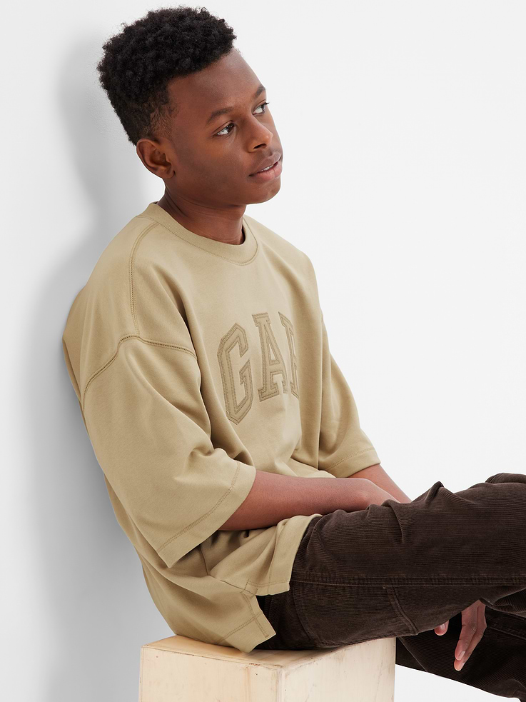 Image 1 of 3, This t-shirt is made with 23% recycled polyester. Less waste in the world. More great clothes for you., Soft knit graphic t-shirt., Crewneck., Short sleeves., Gap arch logo at front., Product #436729