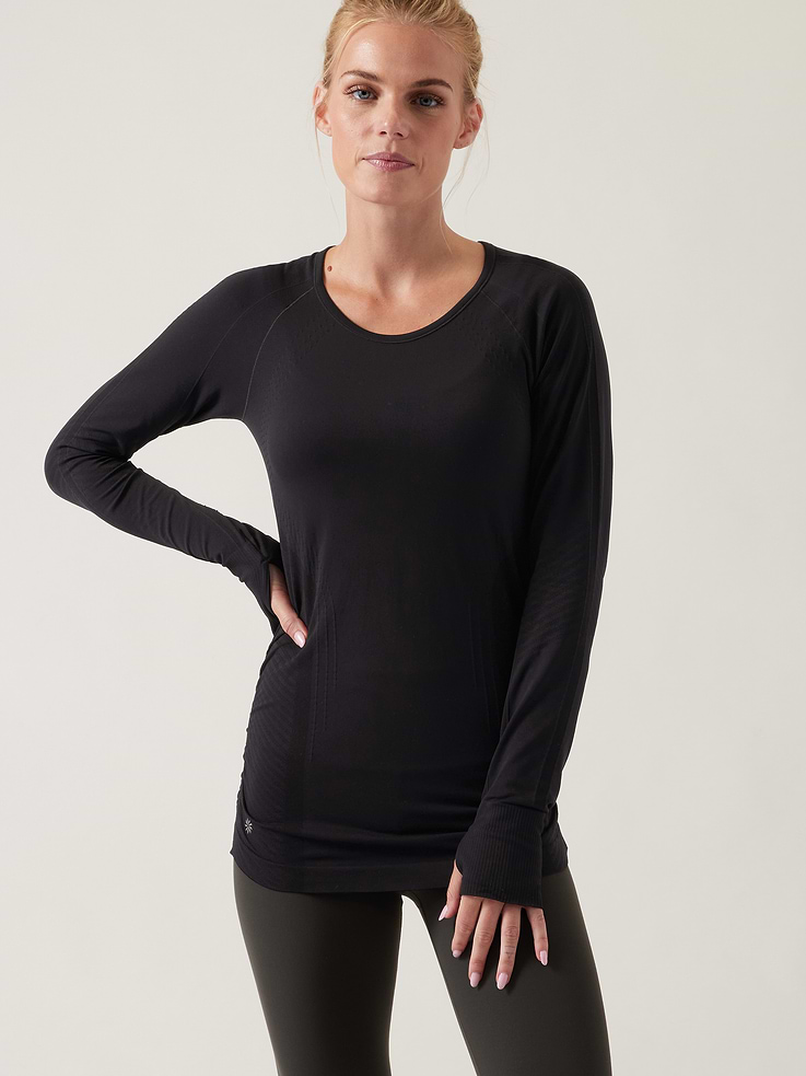 Image 1 of 7, FOR: Medium and high-impact workouts, FEEL: Chafe-free seamless fabric stretches with every move, FAVE: Hem-grippers give you a stay-put fit, Thumbholes keep your sleeves in place, Side-ruching details provide a textured look, Product #150992