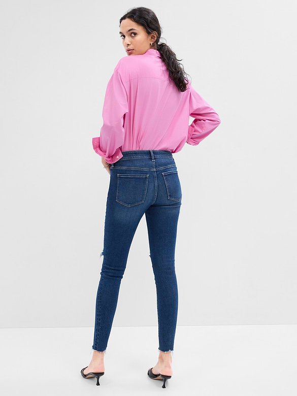 Mid Rise Destructed Universal Skinny Jeans