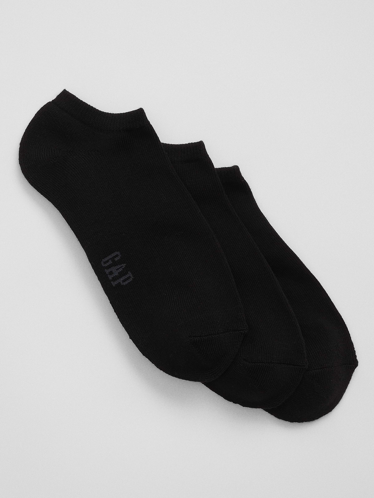 Image 1 of 1, Made with 12% recycled contents., Soft stretch knit., Ribbing at top., Reinforced toe and heel., Gap logo at sole., This product was made in a factory that invests in gender equity and women’s empowerment through RISE. Learn more at, Product #776777