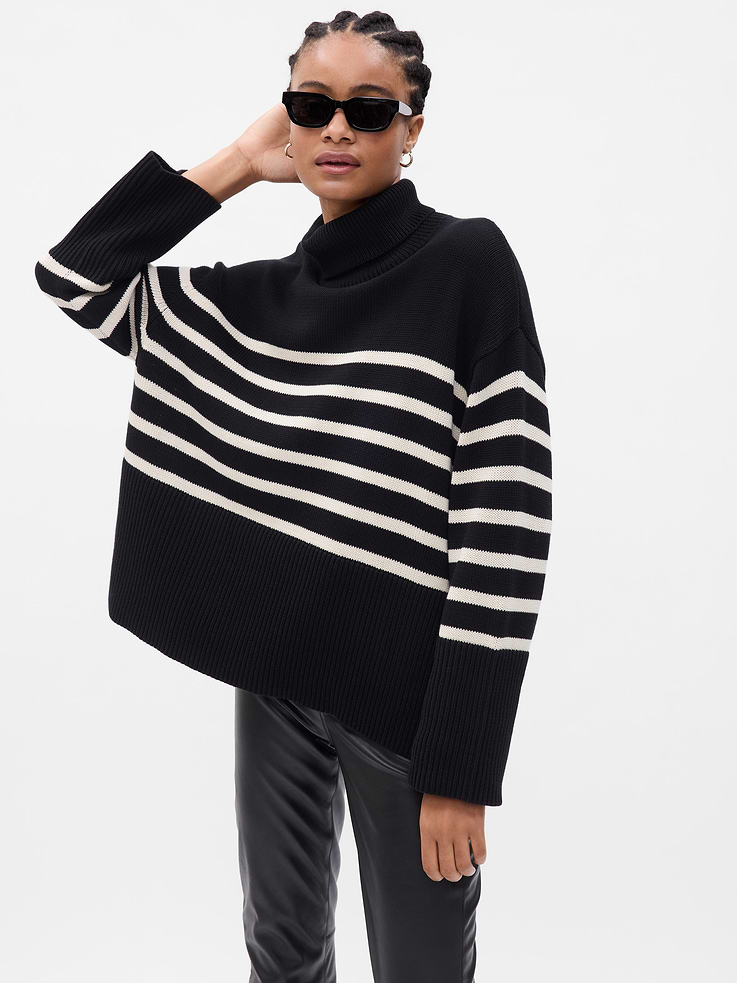 Image 1 of 2, The internet famous sweater you’ll wear Sat–Sat. All new necklines. Same split hem. Never-take-it-off energy., Soft cotton sweater., Turtleneck., Long sleeves with dropped shoulders and ribbed cuffs., Split hem., Certain styles have allover prints., Product #792207