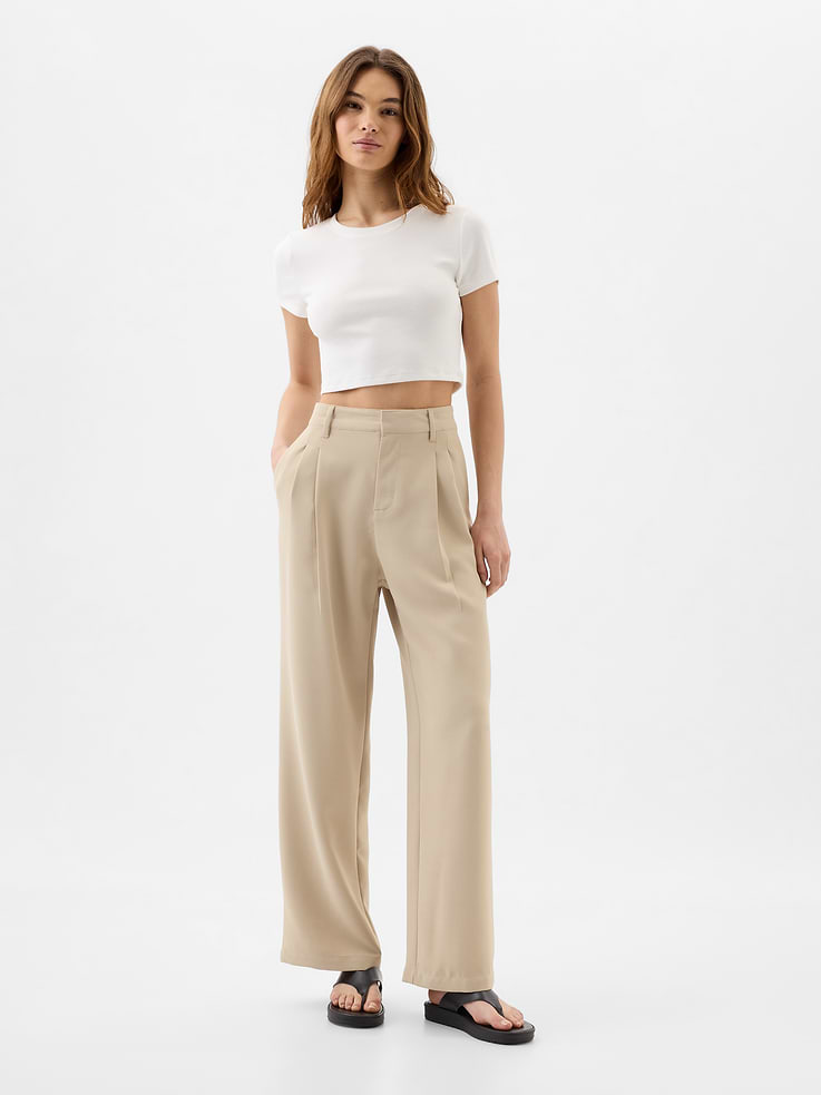 Image 1 of 8, Smooth crepe weave., Elasticized waist at back., Hook and bar closure, zip fly., Front slant pockets, welt pockets at back., Pleated at front., Product #875732
