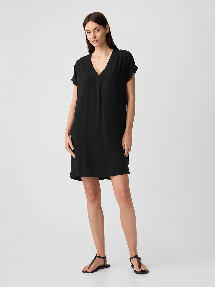 Image 1 of 6, Smooth rayon weave., Short sleeves with folded cuffs., V-neck., Seam at back., Front slant pockets., Select styles have allover print or stripes., Product #595023