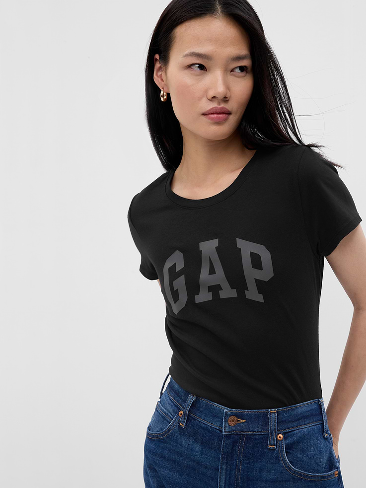 Image 1 of 2, Soft jersey knit., Short sleeves., Crewneck., Assorted Gap logos at front., This product was made in a factory that invests in gender equity and women’s empowerment through RISE. Learn more at, Product #254770