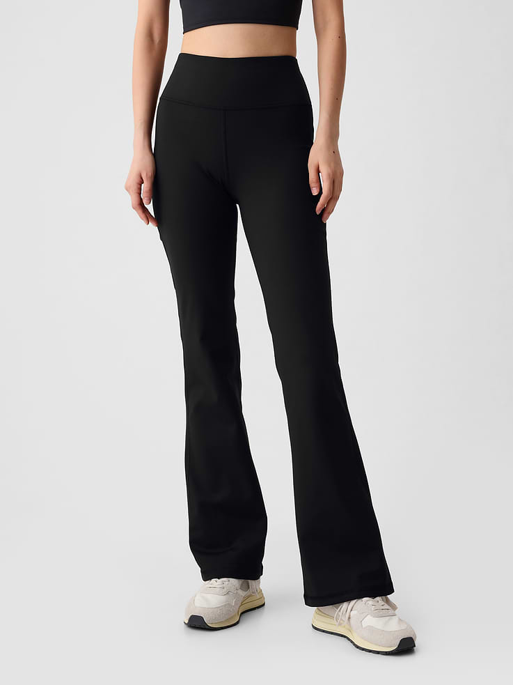 Image 1 of 8, Designed to power your every move. Supersoft, sculpting, contoured-to-you and made with 79% recycled materials., This legging is made with 79% recycled polyester. Less waste in the world. More great clothes for you., Moisture Wicking helps keep your skin dry., Stretch allows freedom of movement while providing superior shape retention., Elongating flatlock contouring seams create smooth lines and help prevent chafing., Smooth, flat, wide waistband., This product was made in a factory that invests in gender equality and women’s empowerment. Through RISE (Reimagining Industry to Support Equality) and Gap Inc.’s program P.A.C.E. (Personal Advancement & Career Enhancement), we support people who make our clothes to build the skills, knowledge, confidence, and resilience needed to advance in work and life. Learn more here ., Product #749402