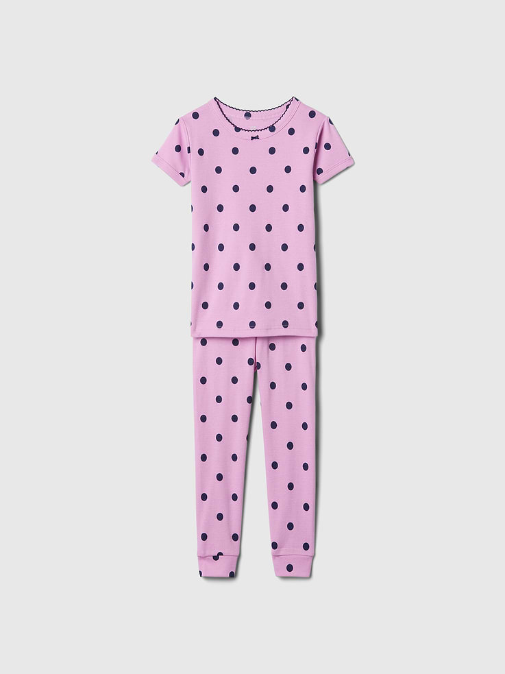 Image 1 of 2, Soft cotton pajama top and pants set., Crewneck., Short sleeves., Elasticized waist at PJ pants., Allover polka dot print., Made with 100% organically grown cotton, which is better for people and the environment because it's grown without the use of harmful synthetic pesticides and fertilizers., This product was made in a factory that invests in gender equality and women’s empowerment. Through RISE (Reimagining Industry to Support Equality) and Gap Inc.’s program P.A.C.E. (Personal Advancement & Career Enhancement), we support people who make our clothes to build the skills, knowledge, confidence, and resilience needed to advance in work and life. Learn more here ., Product #433127