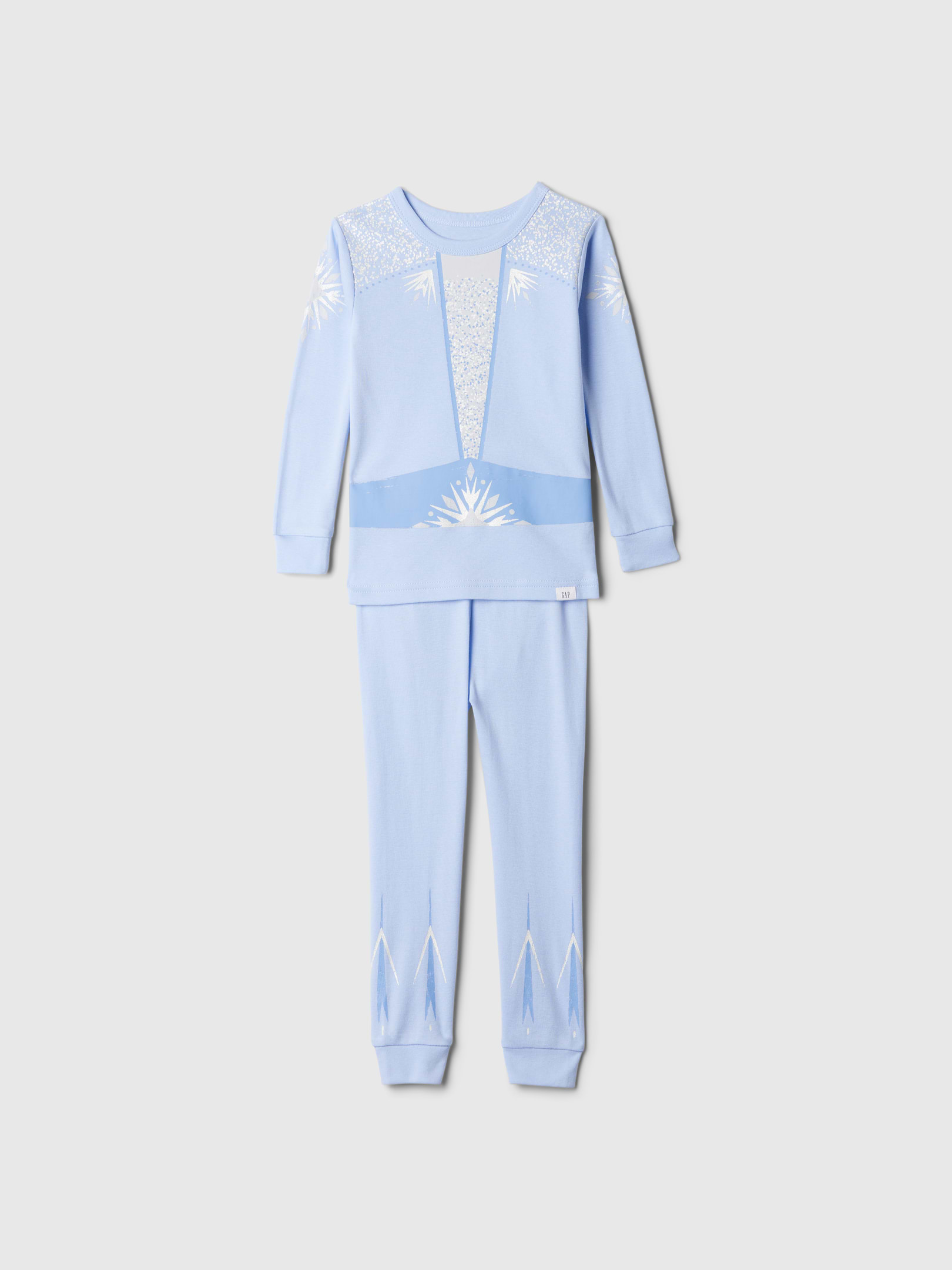 Image 1 of 3, Characters for your little characters. Making every day more special., Soft cotton pajama top and pants set., Crewneck., Long sleeves., Elasticized waist at PJ pants., Allover Disney Princess graphics like Elsa and Snow White., Made with 100% organically grown cotton, which is better for people and the environment because it's grown without the use of harmful synthetic pesticides and fertilizers., This product was made in a factory that invests in gender equality and women’s empowerment. Through RISE (Reimagining Industry to Support Equality) and Gap Inc.’s program P.A.C.E. (Personal Advancement & Career Enhancement), we support people who make our clothes to build the skills, knowledge, confidence, and resilience needed to advance in work and life. Learn more here ., Product #524376