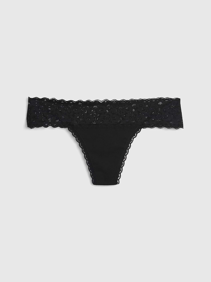 L'image numéro 1 présente Tanga en coton biologique extensible avec bordure en dentelle