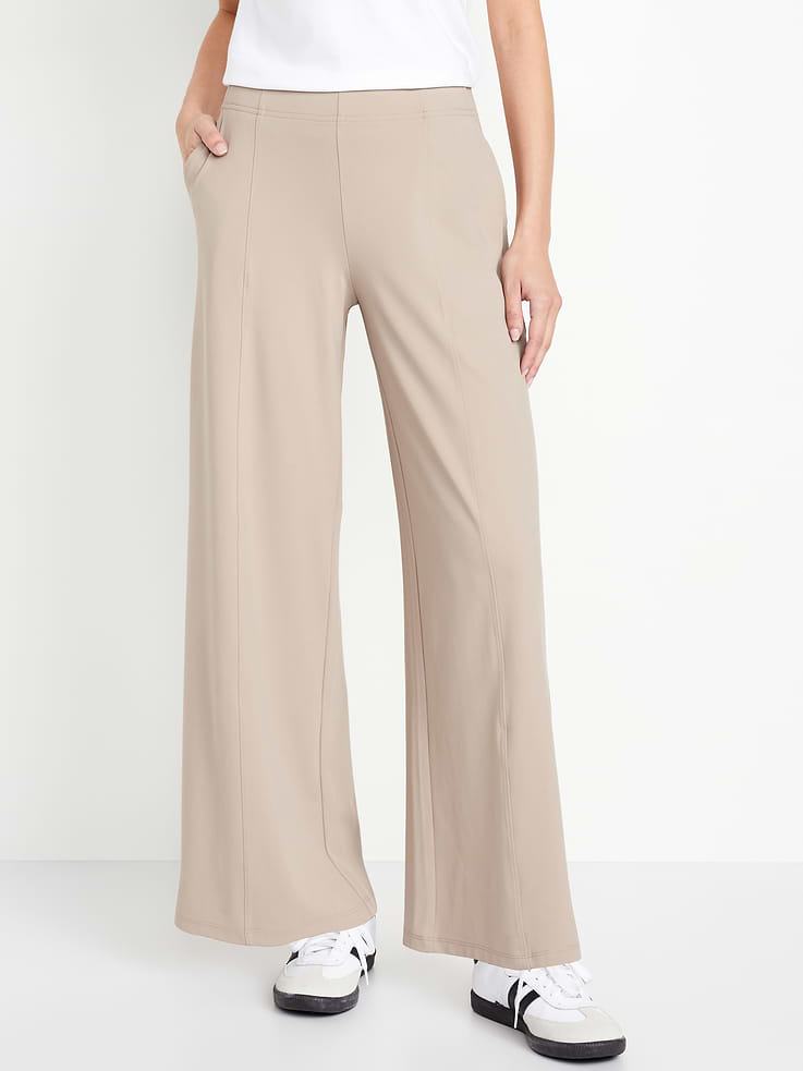 Image 1 of 8, Featuring PowerSoft. Light compression meets a peachy-smooth, sweat-wicking fabric., elasticized waist, hip pockets, seamed front leg, pockets fit your phone, go-dry wicks moisture, pull-on style, Product #484662