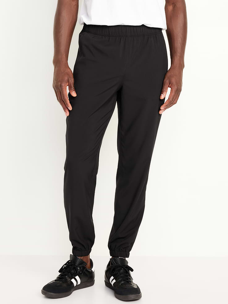 Image 1 of 4, Make your moves in Old Navy Sport's StretchTech: A lightweight, quick-drying fabric with high-performance stretch., elastic-drawstring waist, hip pockets, elastic cuffs, quick drying, breathable, 4-way stretch, Product #506986