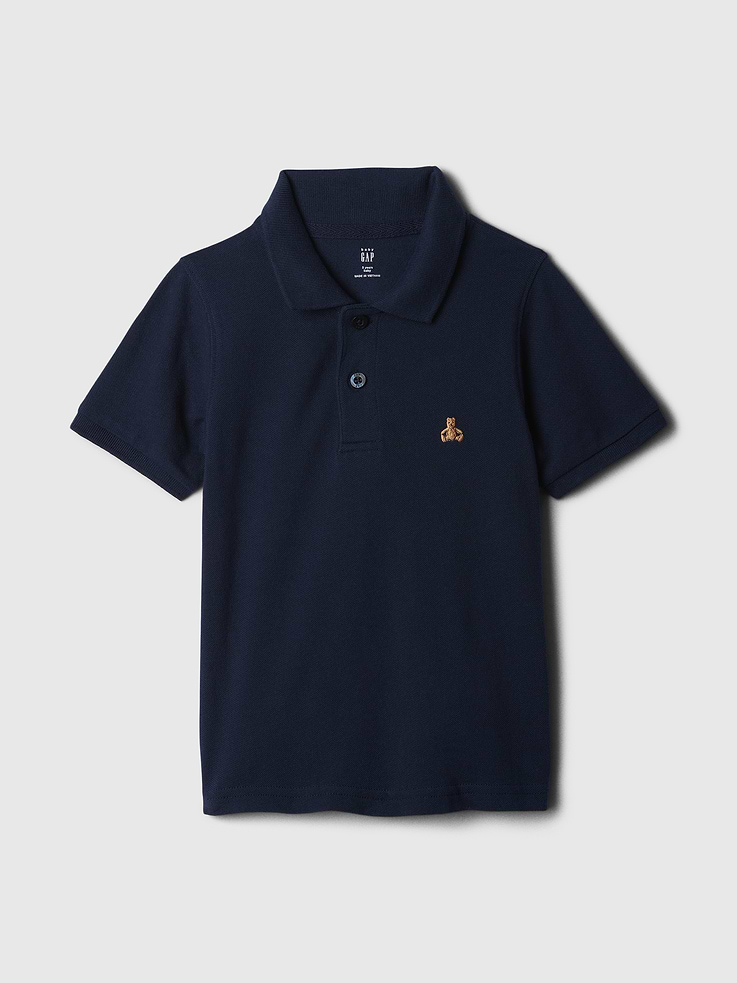 Image 1 of 3, Soft pique knit., Short sleeves., Spread collar, henley button front., Slits at hem., This product was made in a factory that invests in gender equity and women’s empowerment through RISE. Learn more at, Product #528609