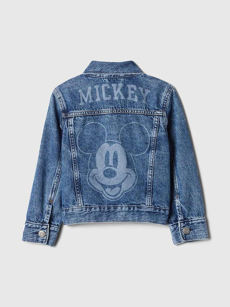 Image 1 of 3, A very special collaboration between Gap and Disney— two timeless, iconic American brands— led us to create a collection that celebrates Mickey Mouse and Minnie Mouse., This style is made with 5% recycled cotton. Compared to virgin materials, using recycled materials helps to reduce resource use and waste., This product is part of our Washwell program, which uses at least 20% less water as compared with conventional wash methods. We’ve saved over a billion liters of water through Washwell since 2016., Non-stretch denim., Long sleeves with button-snap cuffs., Spread collar, button-snap front., Button-snap patch pockets at chest, slant pockets at lower front., Mickey Mouse graphic at back., Banded hem., Product #528173