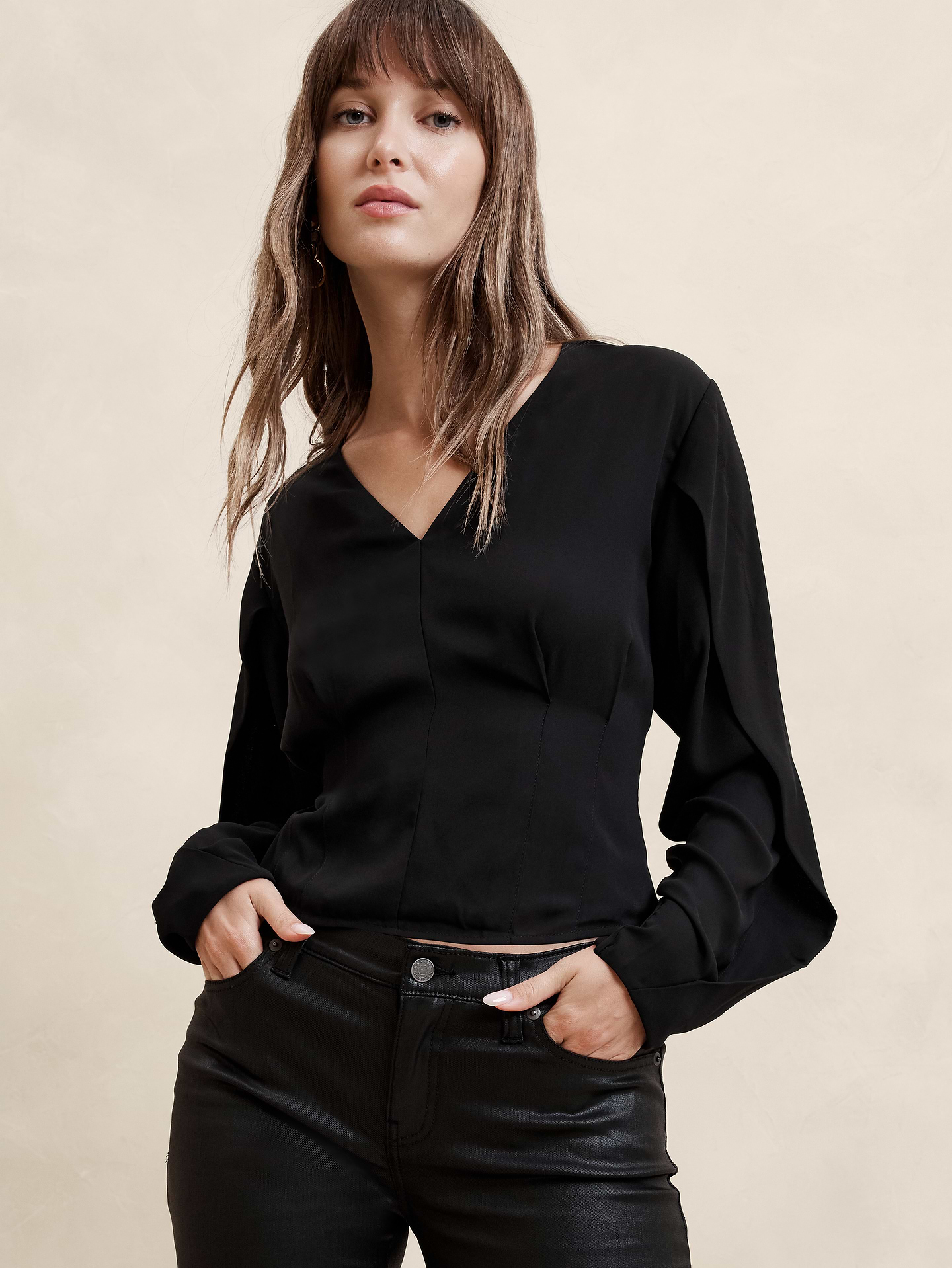 Image 1 of 1, Elevate your wardrobe with the Draped-Sleeve Top, crafted from delicate chiffon for a light and airy feel. This top features charming draped sleeves that add a touch of elegance, perfectly complemented by a seamed bodice for a flattering silhouette., V-neck. Drape long sleeves., Pleated front., Fitted through the waist., Invisible side zipper at wearer's left., Back waist darts., Straight hem., Body lined., Made exclusively for Banana Republic Factory., Product #590182