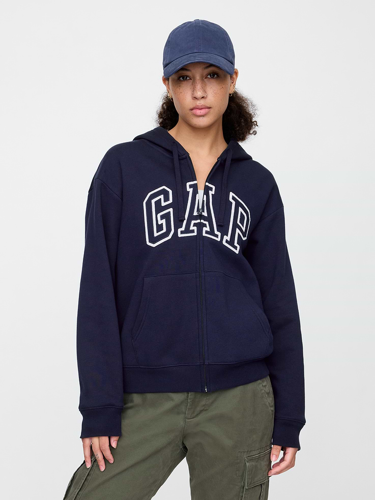 Image 1 of 5, Soft, comfy fleece., Dropped shoulder, long sleeves with banded cuffs., Drawcord ties at hood, zip front., Gap logo at front., Kanga pockets., Banded hem., Note: The dye used in the crafting of this product is prone to crocking, or color transfer. Please avoid contact with light-colored fabric or upholstery., Product #627454