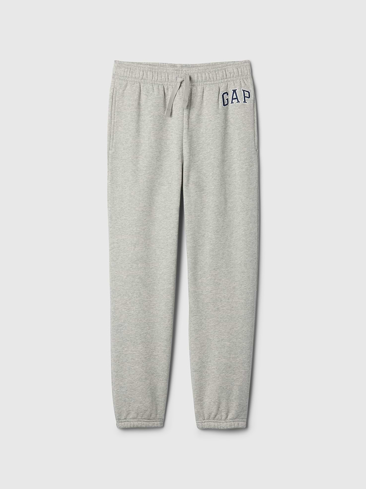 Image 1 of 1, This style is made with 23% recycled polyester. Compared to virgin materials, using recycled materials helps to reduce resource use and waste., Soft, comfy fleece., Drawcord ties at elasticized waistband., On-seam pockets., Gap logo at hip., Elasticized cuffs., This product was made in a factory that invests in gender equity and women’s empowerment through RISE. Learn more at, Product #623754
