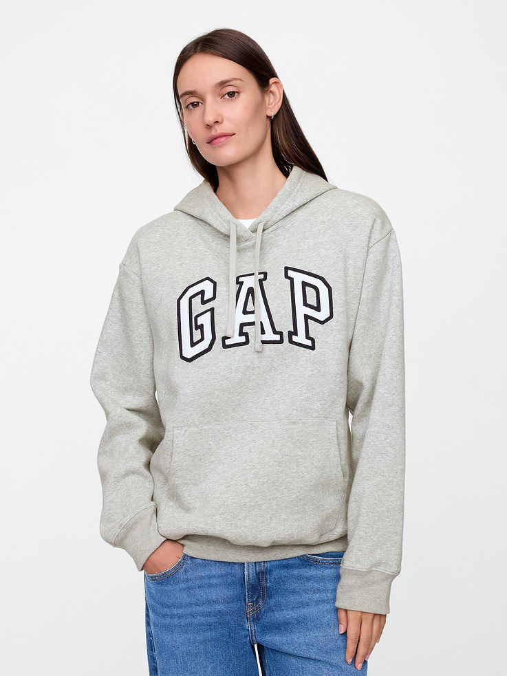 Image 1 of 5, Now even softer with a more relaxed fit., Soft, comfy fleece., Long sleeves with banded cuffs., Drawcord ties at hood., Gap logo at front (select styles have eyelet logo)., Kanga pocket., Banded hem., Select styles have allover print., Note: The dye used in the crafting of this product is prone to crocking, or color transfer. Please avoid contact with light-colored fabric or upholstery., This product was made in a factory that invests in gender equity and women’s empowerment through RISE. Learn more at, Product #870260