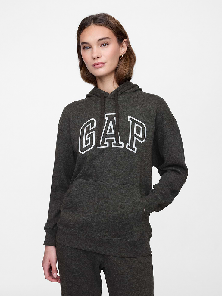 Image 1 of 5, Now even softer with a more relaxed fit., Soft, comfy fleece., Long sleeves with banded cuffs., Drawcord ties at hood., Gap logo at front (select styles have eyelet logo)., Kanga pocket., Banded hem., Select styles have allover print., Note: The dye used in the crafting of this product is prone to crocking, or color transfer. Please avoid contact with light-colored fabric or upholstery., This product was made in a factory that invests in gender equity and women’s empowerment through RISE. Learn more at, Product #870260