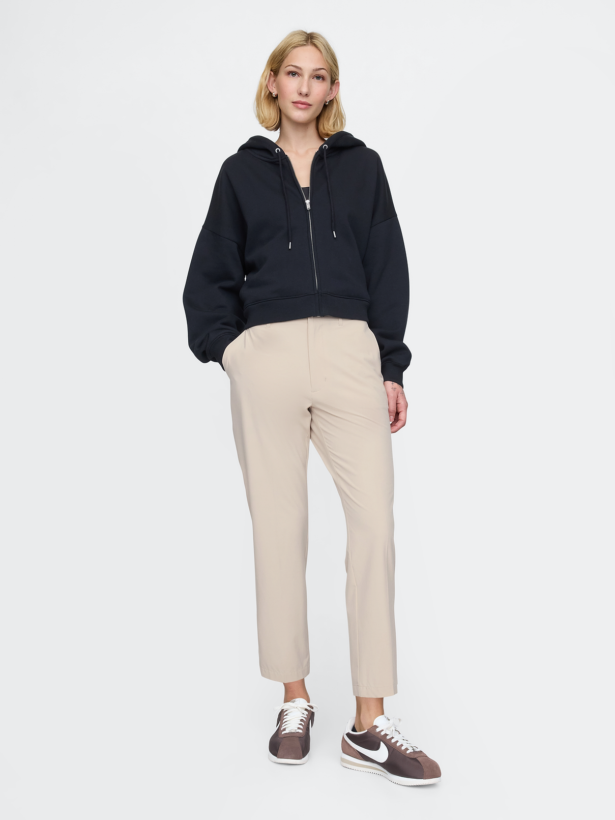 Image 1 of 6, For commuter life, travel days, & everything in between. Designed with an innovative lightweight, stretchy fabric that moves how you do., Soft stretch woven lightweight pants., E-waist with button closure, zip fly., Front slant pockets, back welt pockets., This pant is made with 86% recycled polyester. Using recycled materials helps to conserve resources and reduce waste., This product was made in a factory that invests in gender equality and women’s empowerment. Through RISE (Reimagining Industry to Support Equality) and Gap Inc.’s program P.A.C.E. (Personal Advancement & Career Enhancement), we support people who make our clothes to build the skills, knowledge, confidence, and resilience needed to advance in work and life. Learn more here ., Product #885306