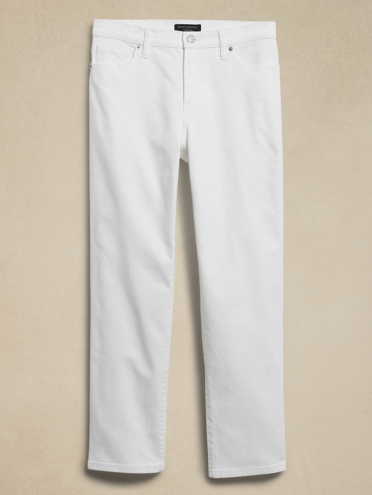 Image 1 of 5, WASHWELL: Better denim. Better planet. These jeans are part of our water-saving Washwell™ program. Compared to conventional wash methods, Washwell™ has saved millions of liters of water since 2016., Button closure with zip fly. Belt loops., Five pocket styling., Rolled hem., Made exclusively for Banana Republic Factory., Product #400997