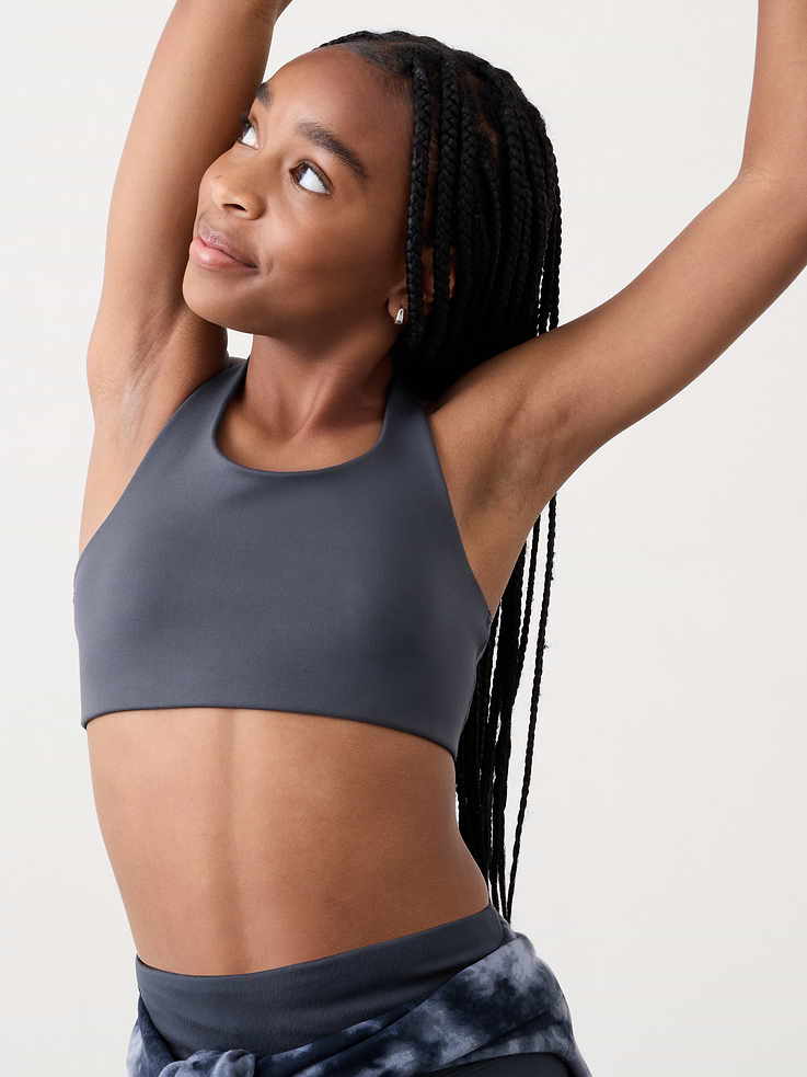 Image 1 of 4, FOR: School, practice, and play, FEEL: Powervita fabric is buttery soft with support that feels like a gentle hug, FAVE: Spacer foam through the front panel provides built-in coverage, Product #658613