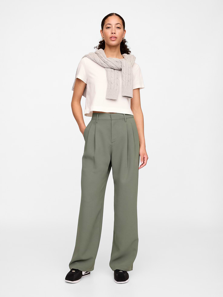 Image 1 of 7, Smooth crepe weave., Elasticized waist at back., Hook and bar closure, zip fly., Front slant pockets, welt pockets at back., Pleated at front., Product #875732