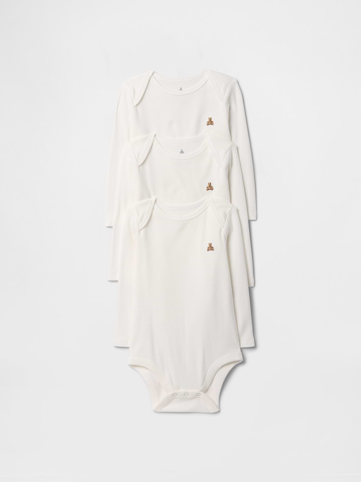 Image 1 of 3, Soft cotton knit., Lapped shoulder, long sleeves., Crewneck., Embroidered Brannan Bear at chest., Snaps at inseam for easy dressing and diapering., This product was made in a factory that invests in gender equity and women’s empowerment through RISE. Learn more at, Product #759443