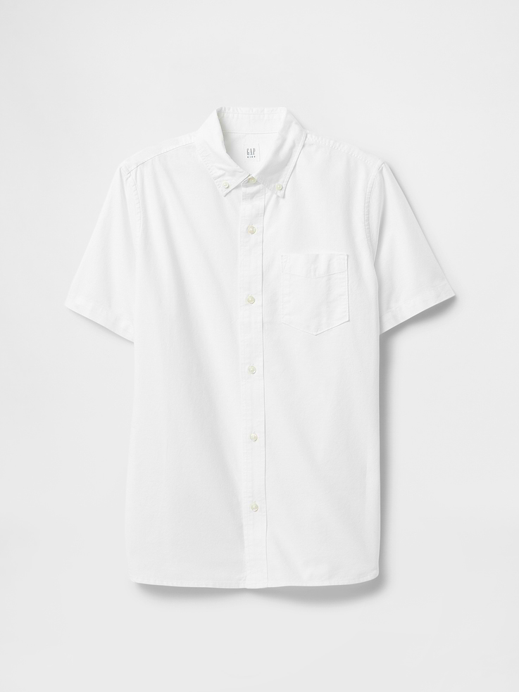 Image 1 of 3, Smooth poplin weave., Short sleeves., Spread collar, button front., Patch pocket at chest., Curved shirttail hem., Select styles have allover print, stripes, or plaid., This product was made in a factory that invests in gender equity and women’s empowerment through RISE. Learn more at, Product #513934