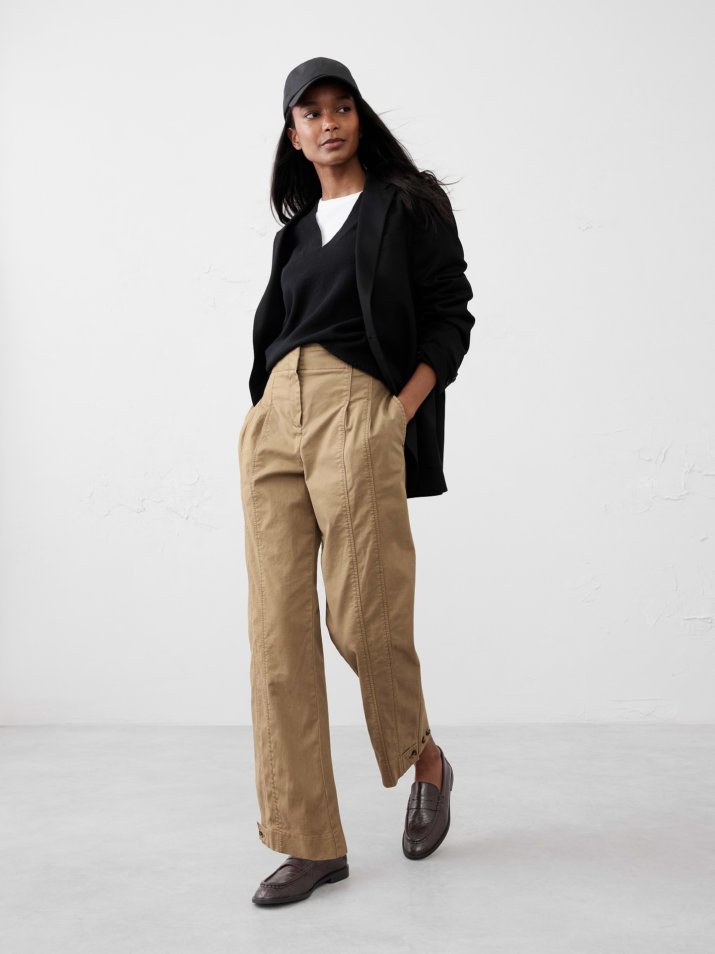Image 1 of 5, Our Chino fabric is washed for a soft hand feel crafted from organic cotton with a touch of spandex for comfort and all day ease., Ankle length., Hook-and-bar front closure. Zip fly., On-seam front pockets., Flap welt back pockets., Adjustable back button tabs at waist., Adjustable tab at hem to convert from barrel to taper leg., Made exclusively for Banana Republic Factory., Product #694905