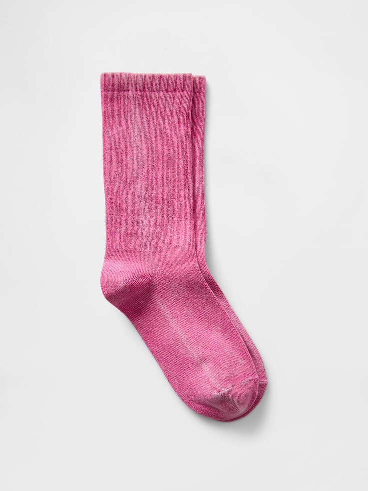 Image 1 of 2, Soft, stretch knit crew socks., Ribbed top., Reinforced toe and heel., Note: Due to the unique fabrication of this product, color transfer is possible. Avoid contact with light-colored fabric or upholstery and handle with care when washing., This product was made in a factory that invests in gender equality and women’s empowerment. Through RISE (Reimagining Industry to Support Equality) and Gap Inc.’s program P.A.C.E. (Personal Advancement & Career Enhancement), we support people who make our clothes to build the skills, knowledge, confidence, and resilience needed to advance in work and life. Learn more here ., Product #684398