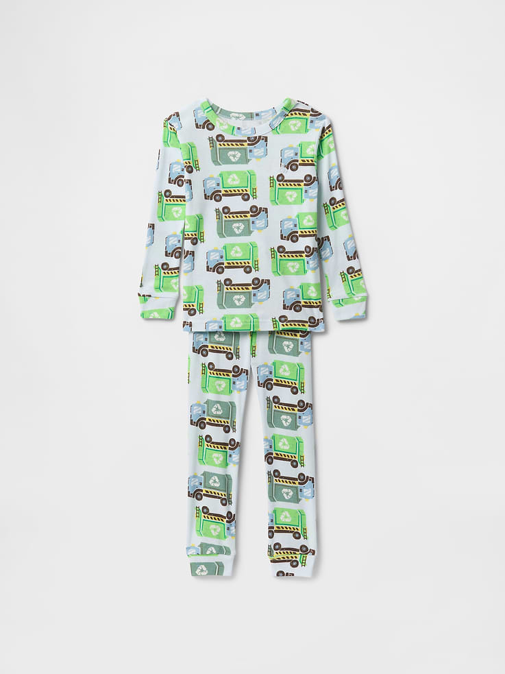 Image 1 of 2, Our comfiest PJs—now softer than ever. Cozy brushed cotton on the inside. All their favorite prints & colors on the outside., Soft cotton pajama top and pants set with a cozy brushed interior., Crewneck., Long sleeves., Elasticized waist at PJ pants., Assorted colors and allover prints., Made with 100% organically grown cotton, which is grown without the use of synthetic pesticides and fertilizers., This product was made in a factory that invests in gender equality and women’s empowerment. Through RISE (Reimagining Industry to Support Equality) and Gap Inc.’s program P.A.C.E. (Personal Advancement & Career Enhancement), we support people who make our clothes to build the skills, knowledge, confidence, and resilience needed to advance in work and life. Learn more here ., Product #738534