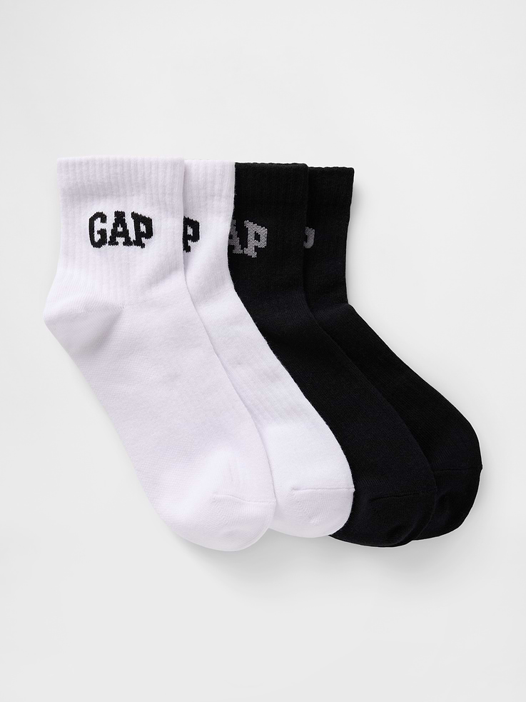 Image 1 of 2, Soft stretch knit., Ribbing at top., Gap logo., Reinforced toe and heel., This product was made in a factory that invests in gender equity and women’s empowerment through RISE. Learn more at, Product #739518