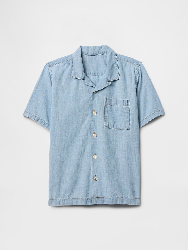 Image 1 of 3, Smooth chambray weave., Short sleeves., Notch spread collar, button front., Patch pocket at chest., This product was made in a factory that invests in gender equity and women’s empowerment through RISE. Learn more at gapinc.com/equity., Product #734974