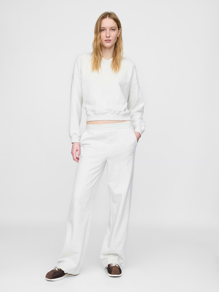 Image 1 of 5, Designed to be soft and breathable, our French Terry goes heavy on comfort. Textured on the inside. Smooth on the surface. Easy and airy all the time., Soft, heavyweight cotton-blend French terry sweatpants., Elasticized waist., Seam details at front., This sweatpant is made with 14% recycled polyester. Compared to virgin materials, using recycled materials helps to reduce resource use and waste., Explore our GapSweats Guide ., Product #723580