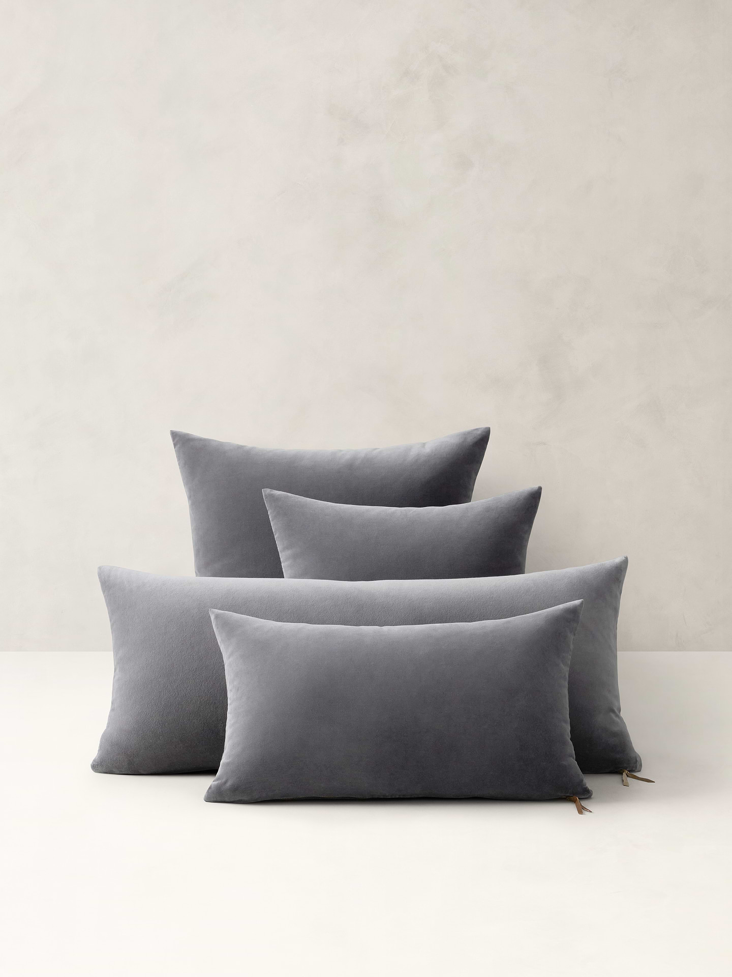 Image 1 of 8, Everyday elegance, crafted of tonal cotton-velvet., Our elegant cotton-velvet pillow cover is expertly tailored for a refined finish and indulgent softness., Exposed brass zip closure with leather pull., OEKO-TEX® STANDARD 100 certification keeps you and your family safe from harmful substances (Certification number: 19.HIN.74318, Hohenstein HTTI)., Pillow inserts are sold separately and are sized slightly larger than our pillow covers to create a fuller effect., Made in India., Product #541119