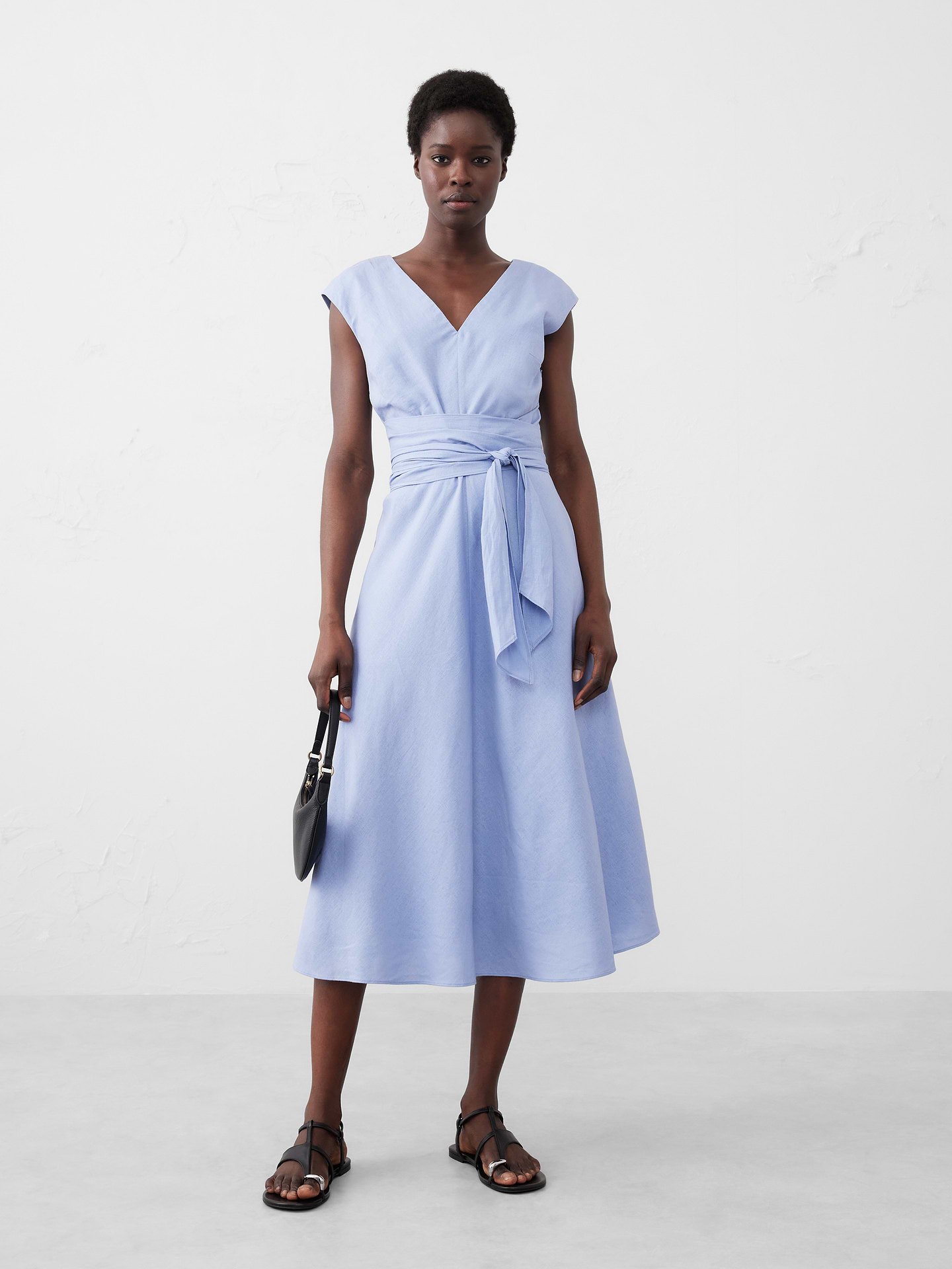 Image 1 of 4, V-neck. Cap sleeves., On-seam front pockets., Invisible side zipper closure at wearer's left., Flounce hem., Fabric belt that can be tied at the front or back for a customizable look., Fully lined., Made exclusively for Banana Republic Factory., Product #705973