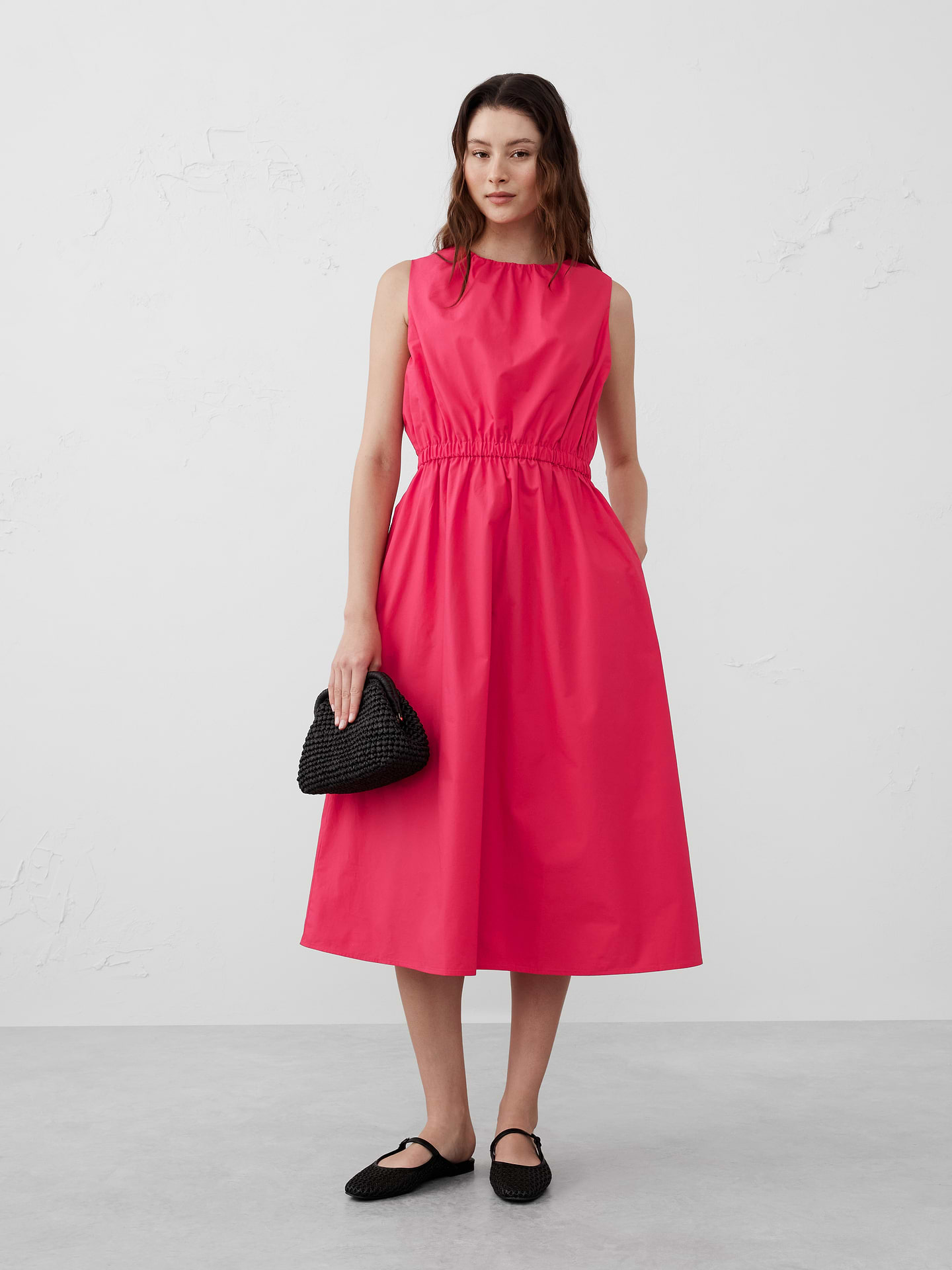Image 1 of 1, Crew neck. Sleeveless., On-seam front pockets., Elastic waistband., Keyhole opening with button back closure., Flounce hem., Made exclusively for Banana Republic Factory., Product #705964