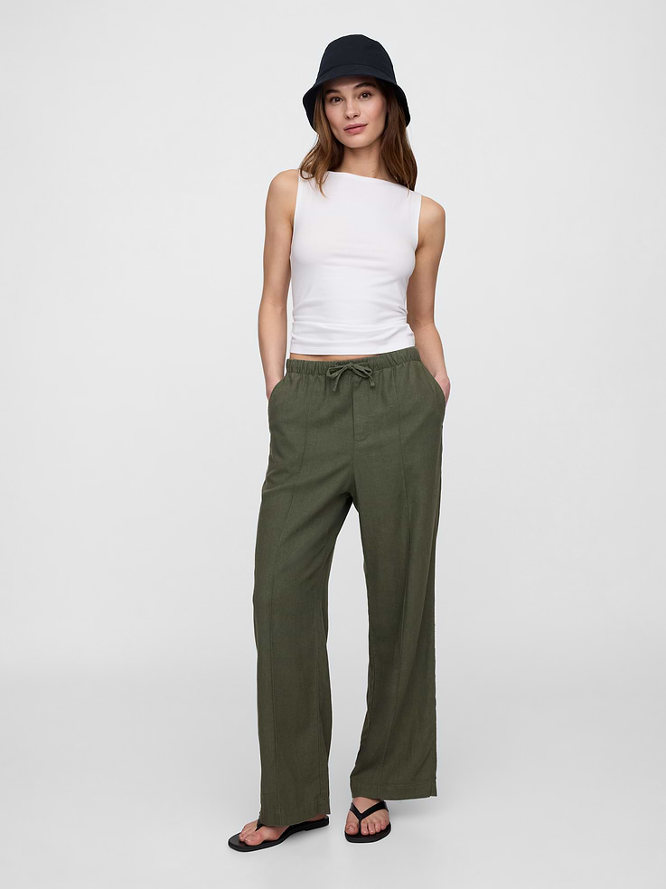 Image 1 of 7, This product is part of our Washwell program, which uses at least 20% less water as compared with conventional wash methods. We’ve saved over a billion liters of water through Washwell since 2016., Smooth linen blend., Drawcord ties at elasticized waist, faux fly., Front slant pockets, patch pockets at back., Seam details at front., This product was made in a factory that invests in gender equity and women’s empowerment through RISE. Learn more at gapinc.com/equity., Product #744898
