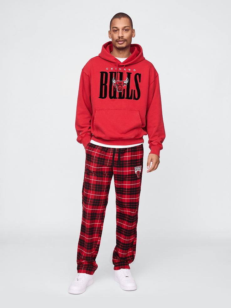 Image 1 of 7, We teamed up with the NBA to celebrate the league’s 75+ year history. Pairing iconic team logos with Gap classics. Made to celebrate the game, for the people who love it most., Soft cotton flannel pajama pants., Elasticized waist with drawcords., Front slant pockets., Chicago Bulls logo at thigh., Product #774002
