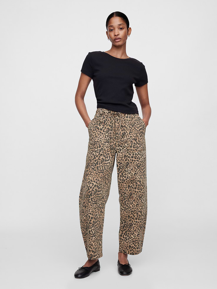 Image 1 of 7, This product is part of our water-saving Washwell program. Compared with conventional wash methods, Washwell uses at least 20% less water., Soft, non-stretch denim., Drawcord ties at elasticized waist, faux fly., Front slant pockets, patch pockets at back., Allover leopard print., This product was made in a factory that invests in gender equity and women’s empowerment through RISE. Learn more at, Product #757399