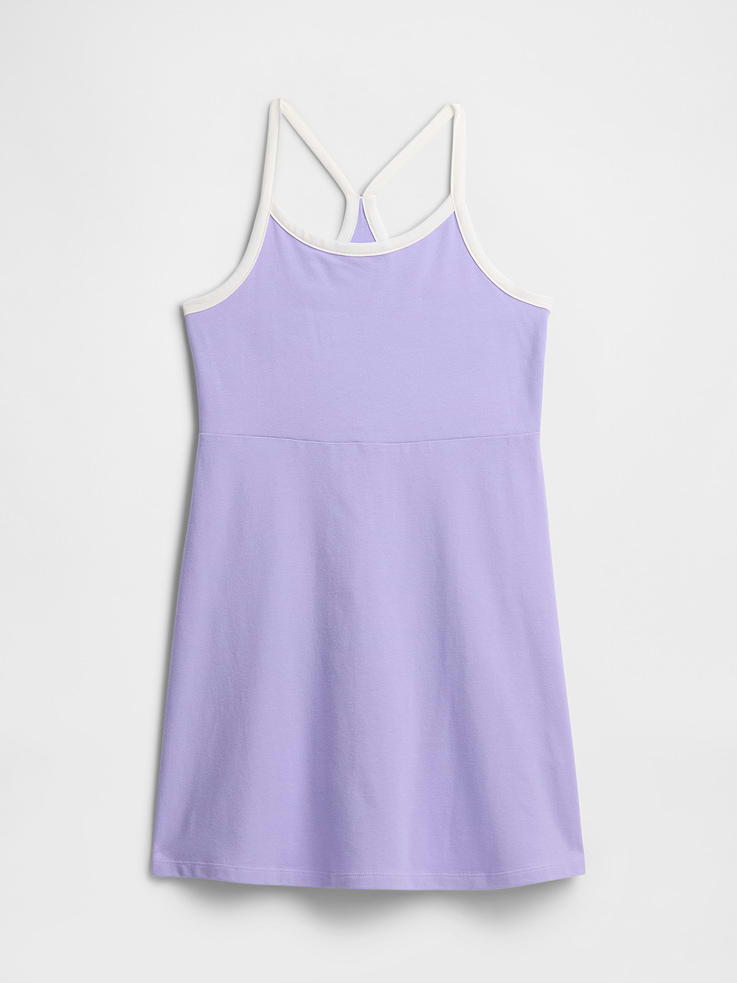 Image 1 of 3, Stretch jersey knit., Racerback tank straps., Scoopneck., Select styles have allover print., This product was made in a factory that invests in gender equity and women’s empowerment through RISE. Learn more at gapinc.com/equity., Product #781099