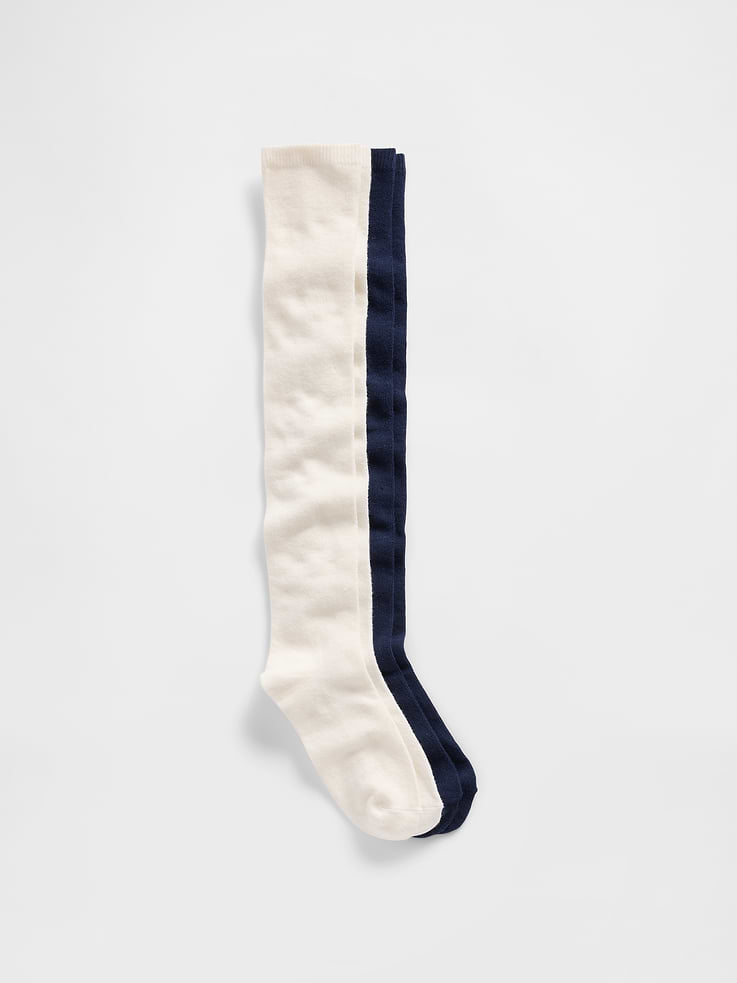 Image 1 of 1, Soft knit knee-high socks., Ribbed top., Reinforced toe and heel., This pair of knee-high is made with 10% recycled polyester. Compared to virgin materials, using recycled materials helps to reduce resource use and waste., This product was made in a factory that invests in gender equality and women’s empowerment. Through RISE (Reimagining Industry to Support Equality) and Gap Inc.’s program P.A.C.E. (Personal Advancement & Career Enhancement), we support people who make our clothes to build the skills, knowledge, confidence, and resilience needed to advance in work and life. Learn more here ., Product #778106