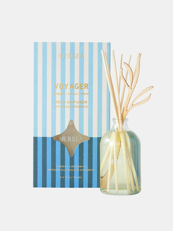 Image 1 of 2, Pepper, Citrus, Moss., The Mersea Voyager scent is inspired by life on the high seas–with an endless horizon, foamy white caps and deep blue water., Voyager has strong aquatic notes punctuated with fiery black pepper, tangerine, citrus, flowers and a hint of oak moss., For those with a spirit of adventure, this scent is sailor fresh., Just right for the places you don’t want to burn a candle—our petite diffuser is great for rooms big or small., The fragrance carries well through our wooden reeds and the engraved bottle is a perfect detail that makes this a special gift., Glass bottle has a rubber stopper and aluminum pull seal., Includes six wooden reeds., Made of essential oils and fragrance.
