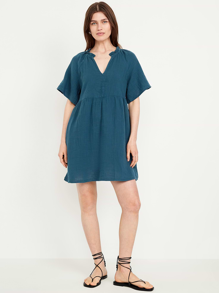 Image 1 of 8, A light, rippled fabric that's begging to be beachside., ruffled split v-neck, short flutter sleeves, hip pockets, shirred detail, mini length, Product #705169