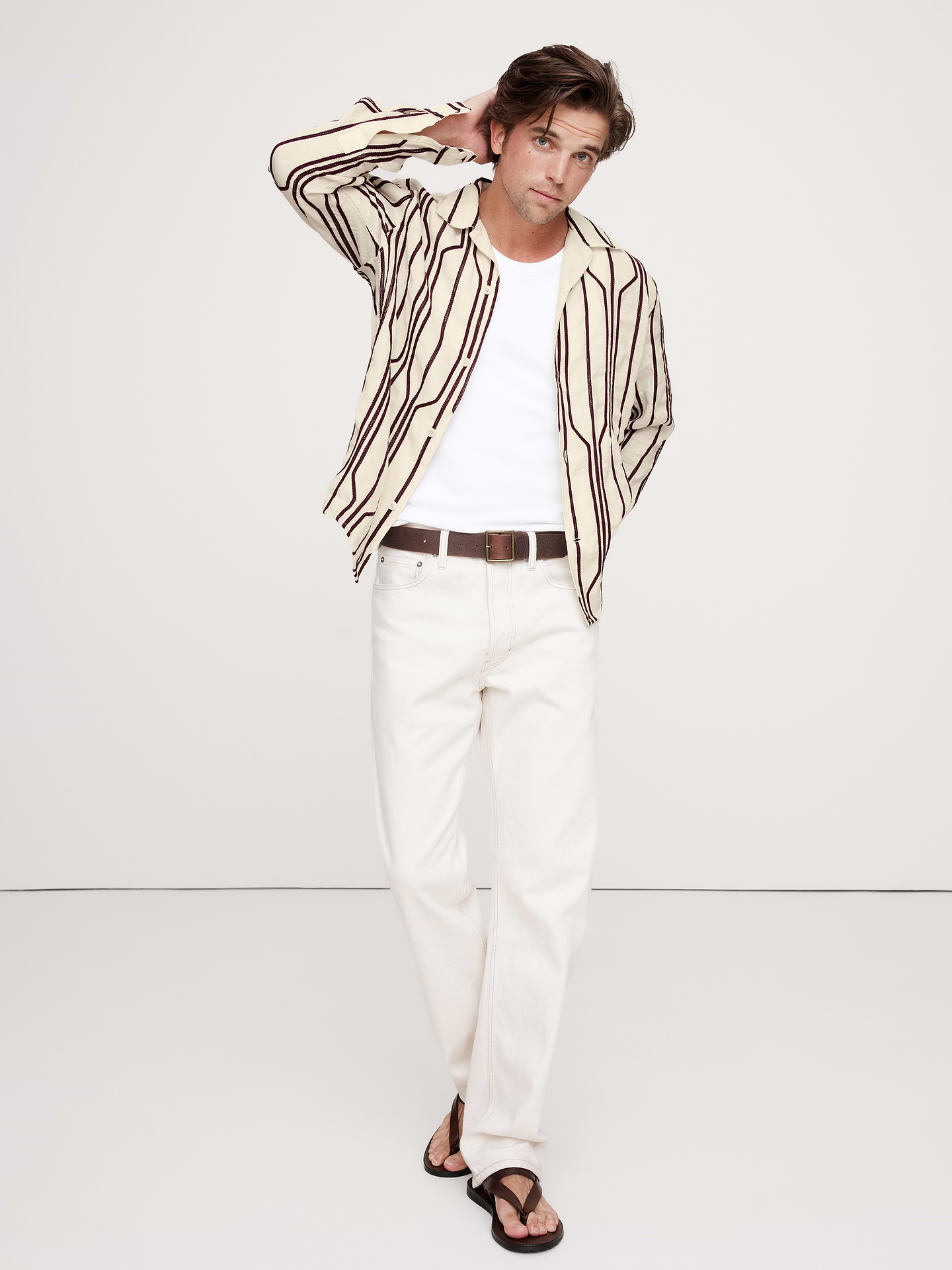 Image 1 of 2, Our long-sleeve take on the season's resort shirt, with embroidered accents for a vintage vibe. Made from 100% certified-European linen., Standard Fit: A straight and easy fit., Resort collar with button-front closure., Straight hem with vented sides., Product #747789