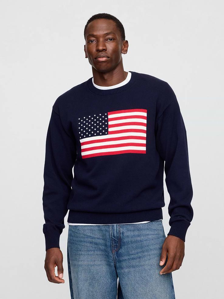 Image 1 of 5, Soft cotton knit., Dropped shoulder, long sleeves with ribbed cuffs., Ribbed crewneck., USA flag at front., Ribbed hem., This product was made in a factory that invests in gender equity and women’s empowerment through RISE. Learn more at, Product #780545