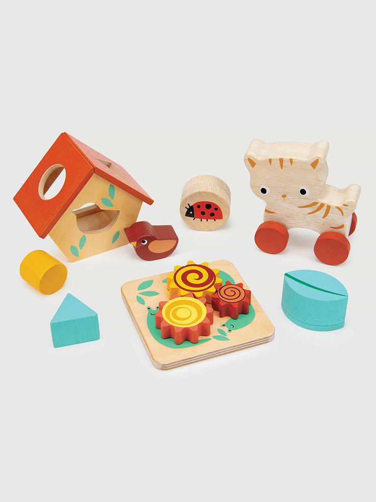 Image 1 of 1, A whole play experience in one handy box that's perfectly designed for your 12~18-month-old., This garden playtime Box contains 5 fun early-learning toys and makes a wonderful gift., A shape sorting bird house with 3 simple shapes to fit., A cogs and gears game to turn and help develop fine motor skills., A kitten on wheels to push or pull and help understand movement., A clacking ladybird to create a sound when twisted and a leaf shape that contains small beads to emit a rainfall sound., Fine motor skills, simple shape sorting, rolling, sensory - sound, cause and effect.